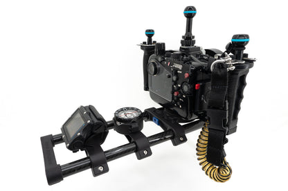 Image shows an example of the Rail Mount System with a large camera, dive computer and compass mounted.